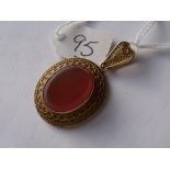 Large gold embossed hard stone pendant