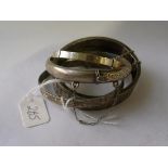 A group of 4 silver bangles 32g