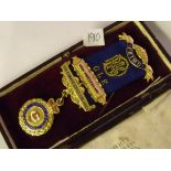 A Masonic enamel and silver Primo medal with ribbon - boxed