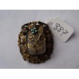 Victorian turquoise & onyx mounted brooch with flower design