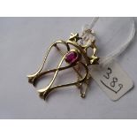 18ct gold brooch set with ruby stamped CH