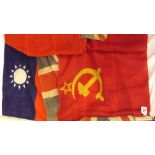 A Soviet union flag and a union jack flag also one other