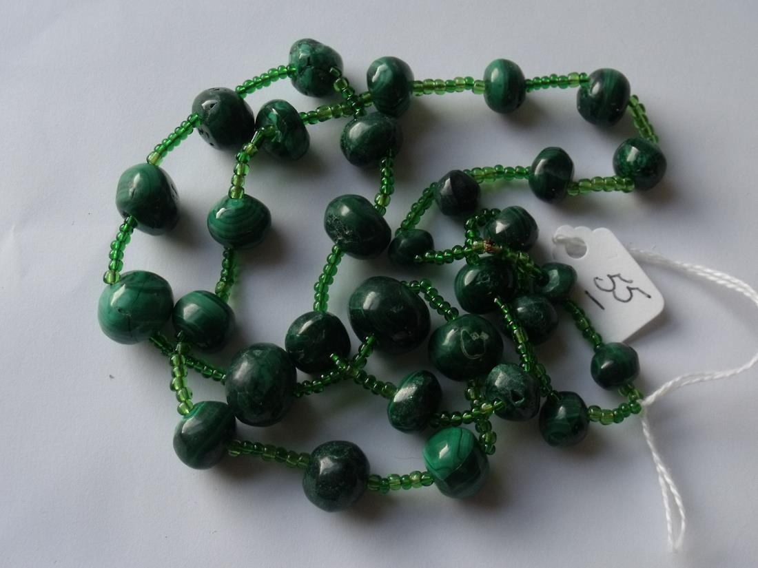A single string of Malachite beads 27" long