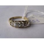 Antique 18ct gold ring set with 5 diamonds in pierced setting with engraved shoulders