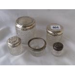 Four silver topped various jars and a mounted salt