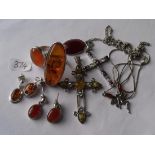A bag of silver and amber etc including two stone set crosses