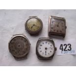 Four old silver wrist watches