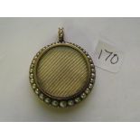 Victorian double sided 9ct locket with pearl surround