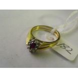 An unusual reversible 18ct gold ruby, sapphire & diamond cluster ring approx size 'O' 5.4g inc
