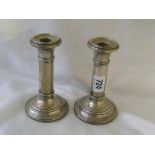 A pair of column circular candle sticks 5.5” high Birm 1919