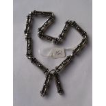 An unusual antique long fancy link silver chain with 2 spare links 30g