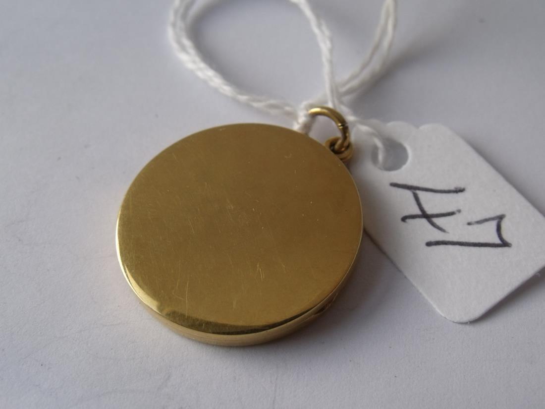 Plain 9ct oval locket 2.5cm dia 6g