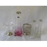 A group of five glass mounted vases