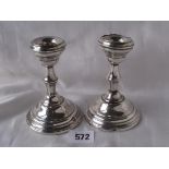 A pair of circular candle sticks Birm. By WA