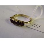 9ct five stone garnet ring approx size 'Q'