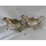 Pair George III sauce boats, each on three legs. 7in long. London 1774 By W.S? 550g