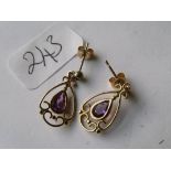 Another similar pair set with amethyst in 9ct mounts