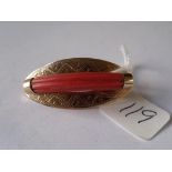 Gold and coral brooch