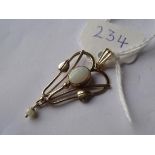Art Nouveau gold and opal pendant with central oval opal suspending an opal bead