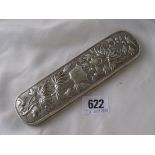 Heavy Chinese silver brush back decorated with Chrysanths. By HC. 130g