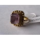 An unusual high carat gold amethyst set ring approx size 'K' 7.5g