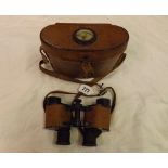 A cased pair of US Signal Corp Bausch & Lomb binoculars w/ compass