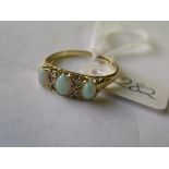 18ct gold opal & diamond set ring 'O'