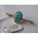 Gold mounted turquoise bar brooch