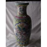 Large oriental vase with panels depicting fighting figures 24” high