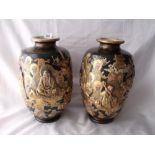 Pair of Satsuma vases decorated in Bas relief 14” high