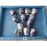 Group twelve Nankin cups with scroll handles