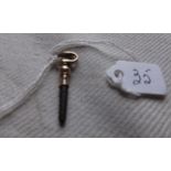 Antique part gold ratchet watch key.