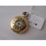 A ladies 14ct gold half hunter fob watch with attractive enamel dial