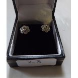 Pair of attractive 9ct diamond cluster earrings boxed