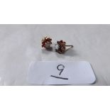 Pair gold mounted opal & ruby ear studs