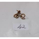 Pair gold mounted buckle earrings