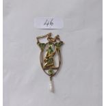An unusual 18ct gold Egyptian pendant inlaid with green enamel and set with peridots and pearl