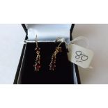 Pair of gold and garnet drop earrings