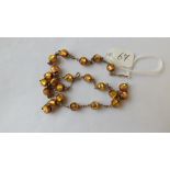 Yellow foil glass necklace 17" long