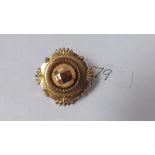 10ct Victorian target brooch with glass panel to back 6.9g inc