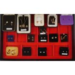 15 pairs of gold earrings. 15 pairs of 9 carat gold ear studs and earrings set with precious and