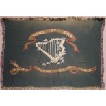 Sons of Eireann banner. A large green banner, centred with a shamrock-entwined harp, ribbons above