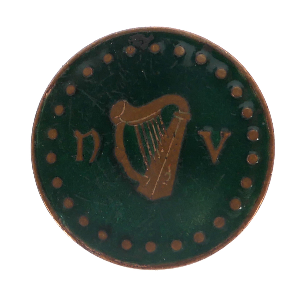 National Volunteers brass and enamel pin. A brass and green enamel circular lapel badge, by P Quinn,