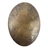 George III, Dungannon Corps cross belt plate. A brass oval convex cross belt plate engraved to the