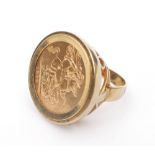 Elizabeth II gold sovereign, 1979, mounted in gold ring. Total weight 14.6g.
