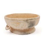 1st millennium BC, Iron Age earthenware bowl. A buff-coloured, fired earthenware circular bowl, on