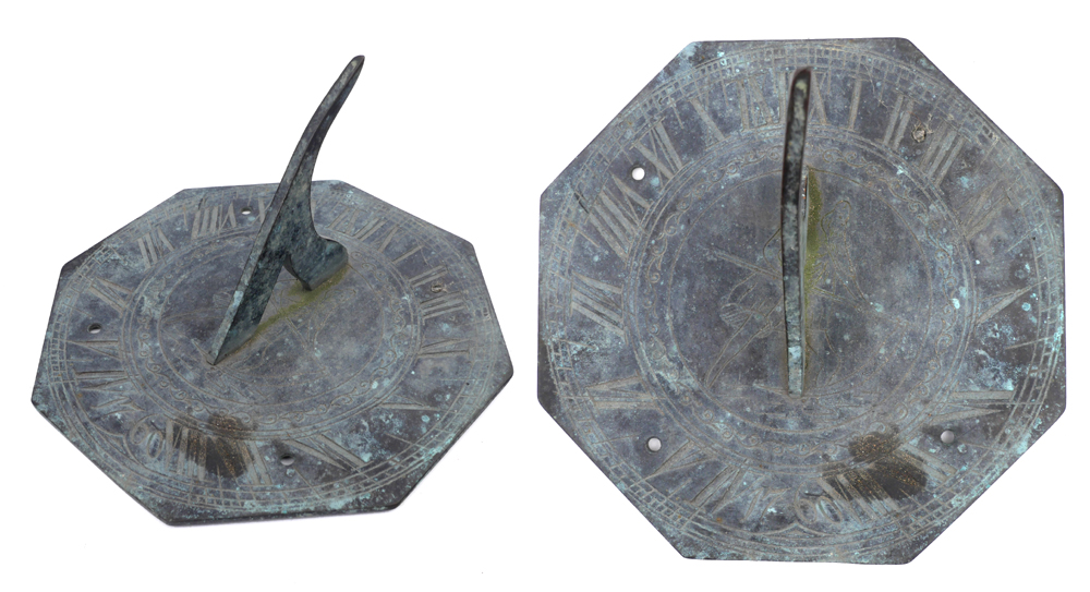 1760 Brass sundial. An 18th century brass octagonal sundial, centred with a figure of Father Time,