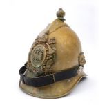 19th century German brass firefighter's helmet. The scalloped comb with ball finial above German