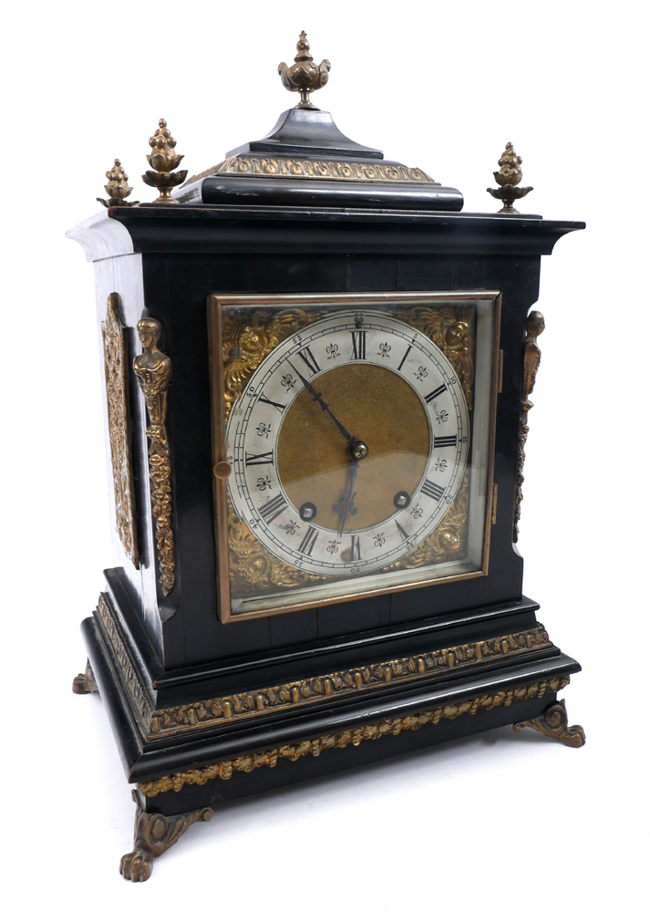 Bracket clock An early 20th century brass-mounted ebonised bracket clock of architectural form,