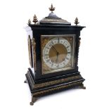 Bracket clock An early 20th century brass-mounted ebonised bracket clock of architectural form,